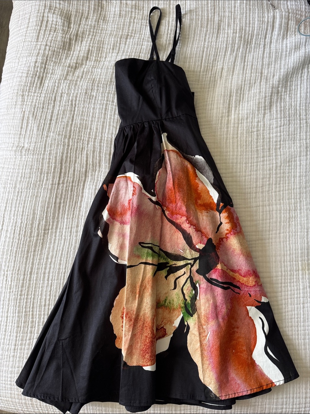 Anthropologie Black Romper with Orange-Pink Floral Design
